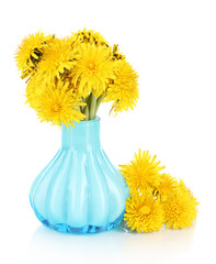 Dandelion flowers in vase isolated on white
