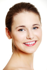 Obraz premium Beautiful teen woman's face with fresh clean skin