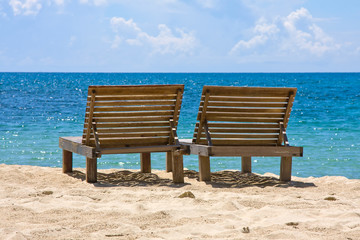 Deck chairs on the beach, Thailand