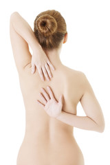 Naklejka premium Woman with pain in her back.