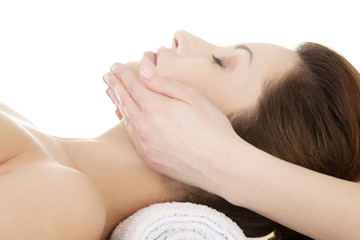 Obraz na płótnie Canvas Woman enjoy receiving face massage