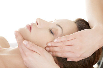Obraz na płótnie Canvas Woman enjoy receiving face massage