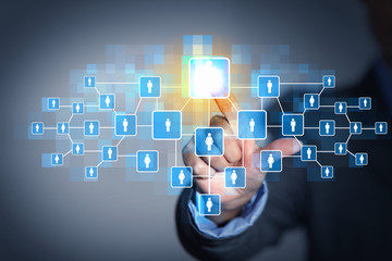 Image of male touching icon of social network