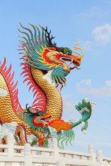 Fototapeta premium Dragon statue with blue sky.