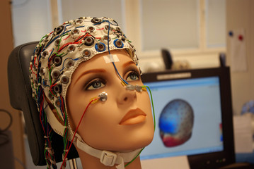 A beautiful woman manikin with EEG hat