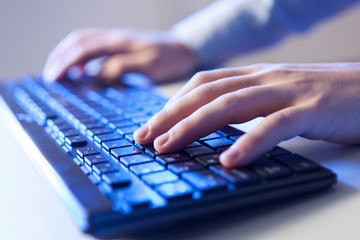 Click! Hands of a man on keyboard