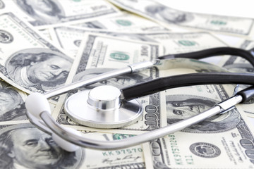 Money and stethoscope, medical insurance