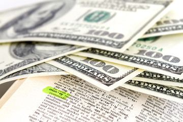 The word money in dictionary and dollars