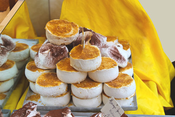 Tray with meringue in the store. France