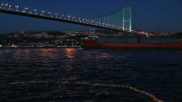 container ship passing under the Bosporus Bridge