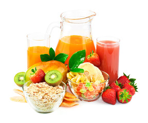 Breakfast ingredients with juice and fresh fruit