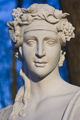 Fototapeta na wymiar Baroque sculpture of a young woman, bust.