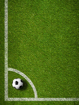 Soccer ball in corner kick position. Football field top view.