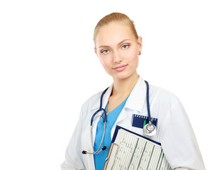 Smiling young doctor in white coat standing
