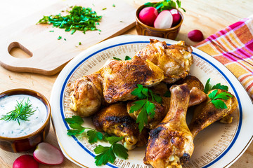 Baked Chicken legs board table wooden meat food roast grilled