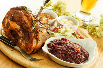 eisbein with braised cabbage, mashed potato, and beer