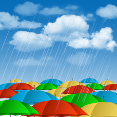 Colorful umbrellas in rain.