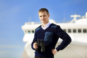 boatswain near the boat © Masson