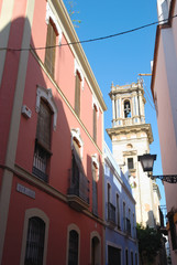 Narrow street in the historic center of Seville, Spain.