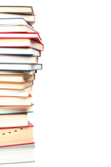 Stack of books on white background