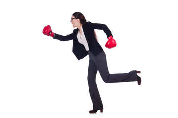 Businesswoman in boxing concept on white