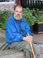 Homeless man with cane