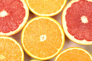 Fototapeta na wymiar Fresh Sliced citruses