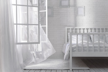 Bedroom with an open window and a light breeze on a sunny day