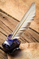 Blue ink with feather on old vintage letter