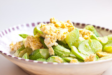 Fried egg with cucumber