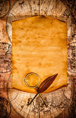 Blank old paper against the background of an ancient map