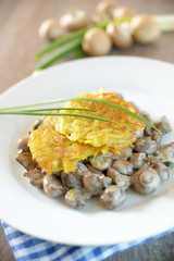 Rösti aus Kartoffeln mit Pilzen