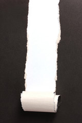 Torn black paper  with color background
