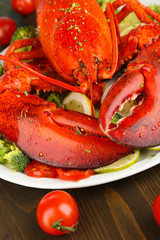 Red lobster on platter on table close-up