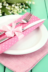 Table setting in white and pink tones