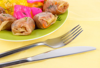 Stuffed cabbage rolls on beige background close-up