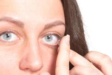 Young woman with contact lenses