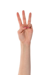 Female hand showing three fingers isolated on white background