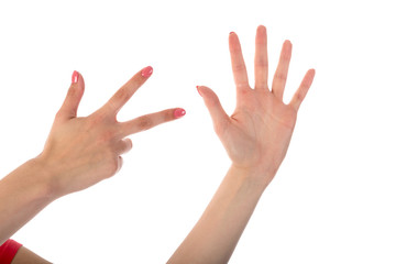 Female hands showing eight fingers isolated on white background