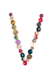 Letter alphabet formed of buttons