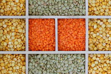 Selection of lentils in wooden compartments
