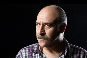 Annoyed Bald Man with Mustaches. Angry Expression