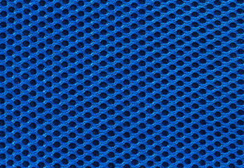 Blue fabric texture with holes in high resolution