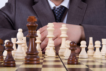 Businessman Thinking while Playing Chess