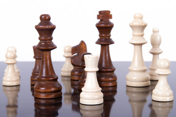 Chess Pieces on Glass Table