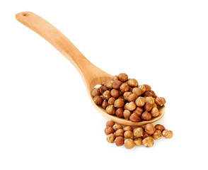 Hazelnuts in wooden spoon
