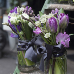 bouquet of blue hyacinth in vase of glass.