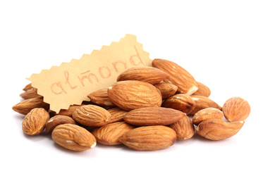tasty almonds nuts, isolated on white