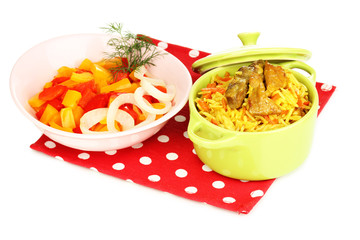 Delicious pilaf with vegetables isolated on white