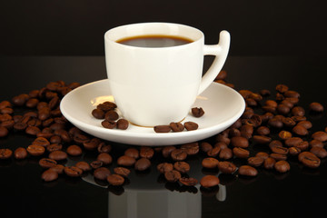 Cup of strong coffee isolated on black